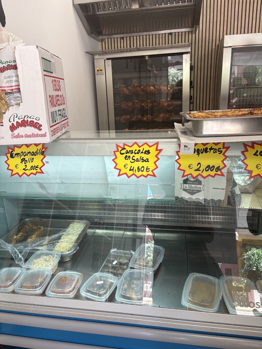 Comida para llevar pizzas y pollos