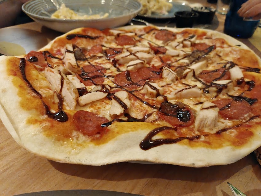 La Famiglia se sienta a la mesa